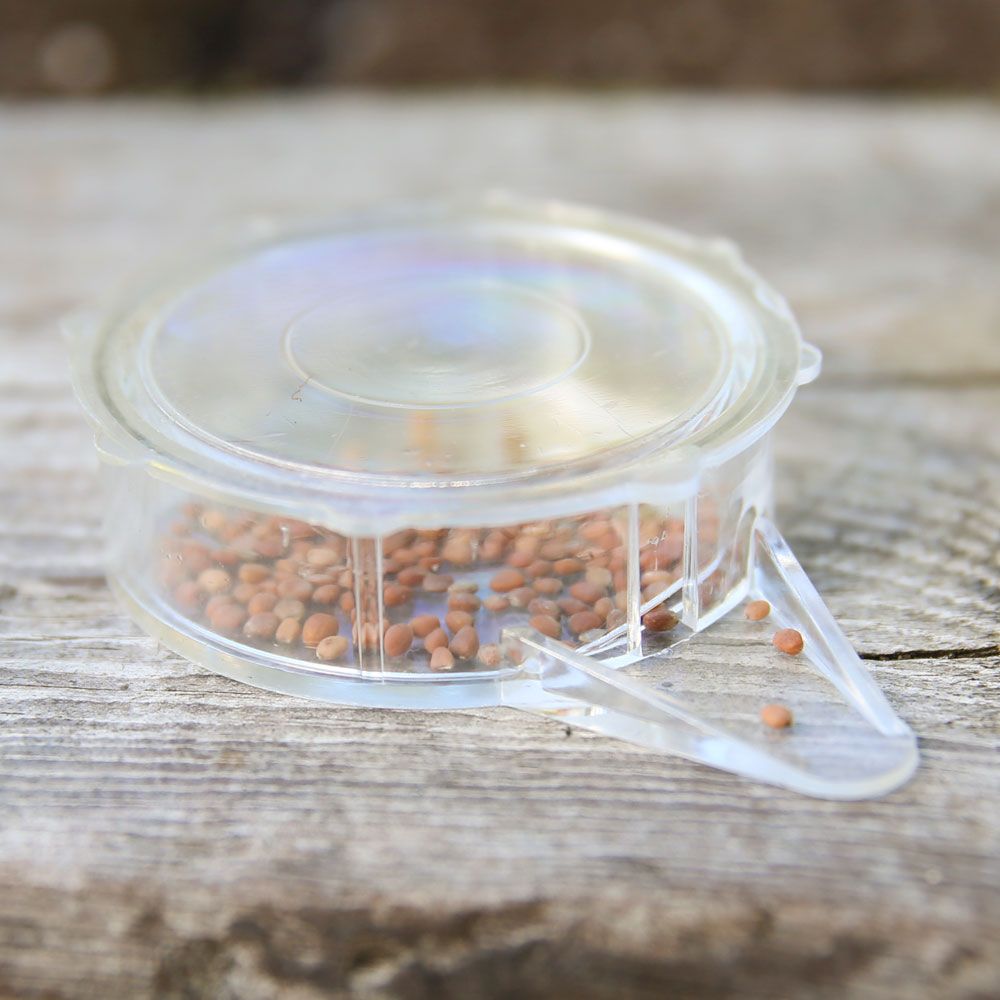  Sådosa av genomskinlig plast för enkel dosering av fröer vid sådd. 